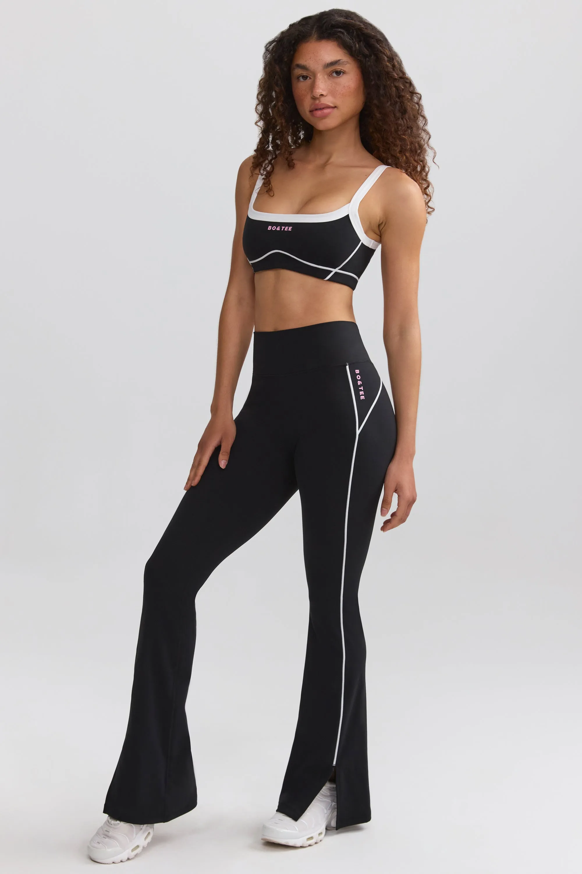 Petite Soft Active Contrast-Trim Flared Trousers in Black